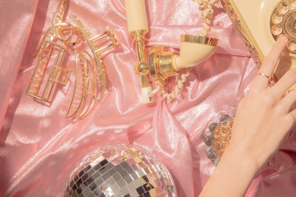Gold Vintage Items on Pink Silk Cloth